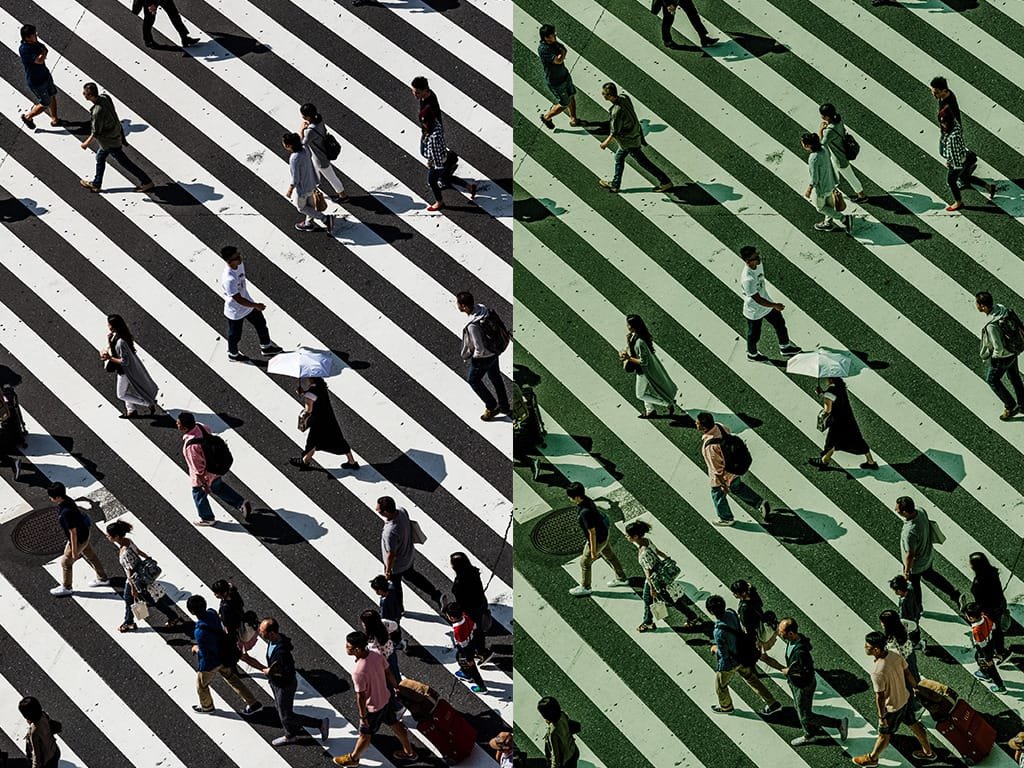 people walking on a crossing with a matrix filter