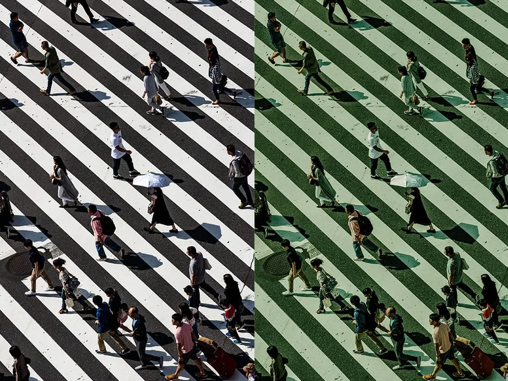 people walking on a crossing with a matrix filter