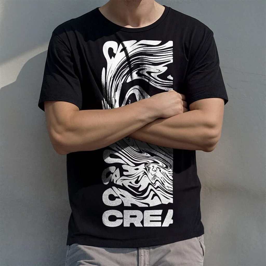 Man wearing a black t-shirt stand behind a concrete wall