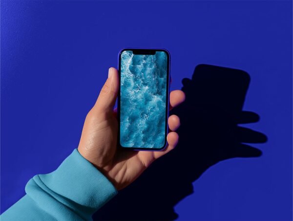 hand holding an iPhone, free Mockup