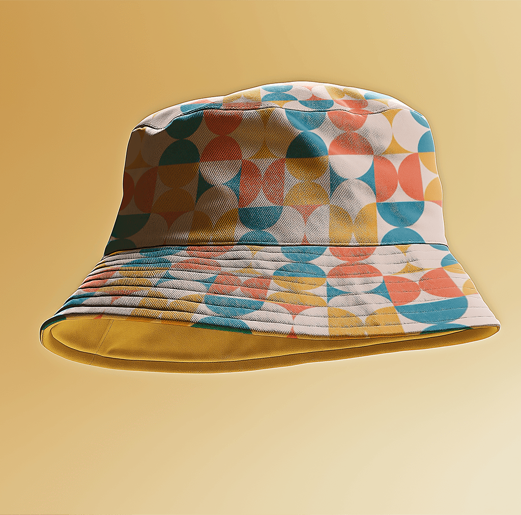 floating bucket hat with a pattern on a yellow background