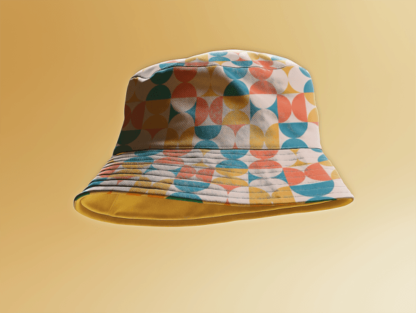 floating bucket hat with a pattern on a yellow background