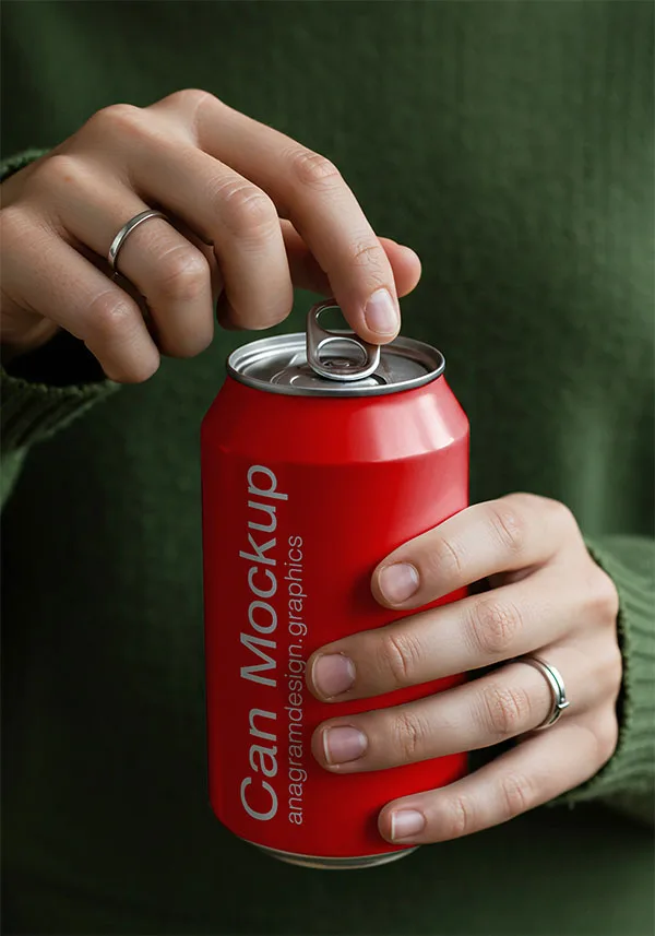 Girl hands holding a Coca Cola Can