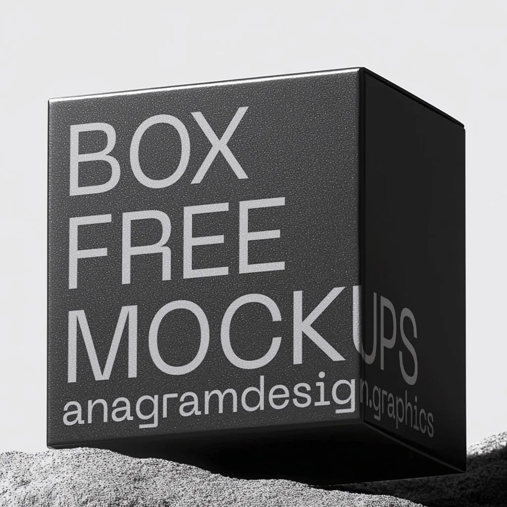 Close up on Square Box on a grey rock with hard shadows