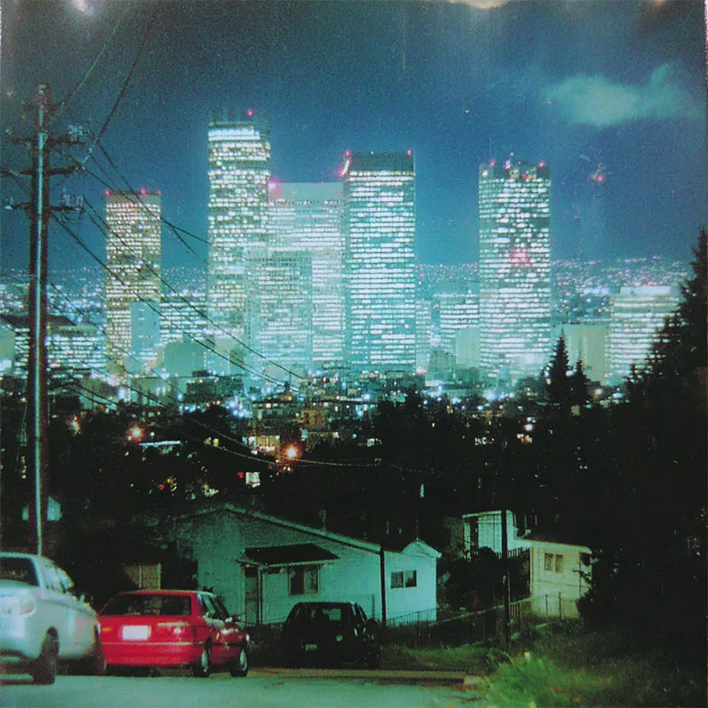 City by night with low-fidelity, analog style applied