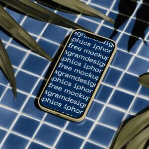 Iphone layed on blue tiles