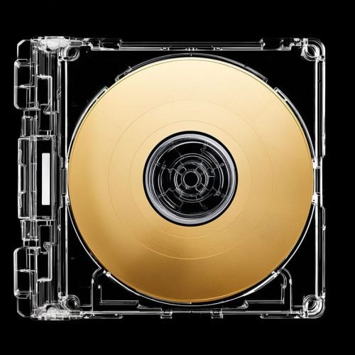 Clear CD Case Mockup with a golden compact disk inside, black background