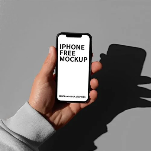 hand holding an iPhone, free Mockup